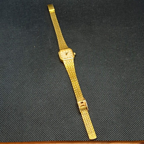 Gold toned rotary - toned,